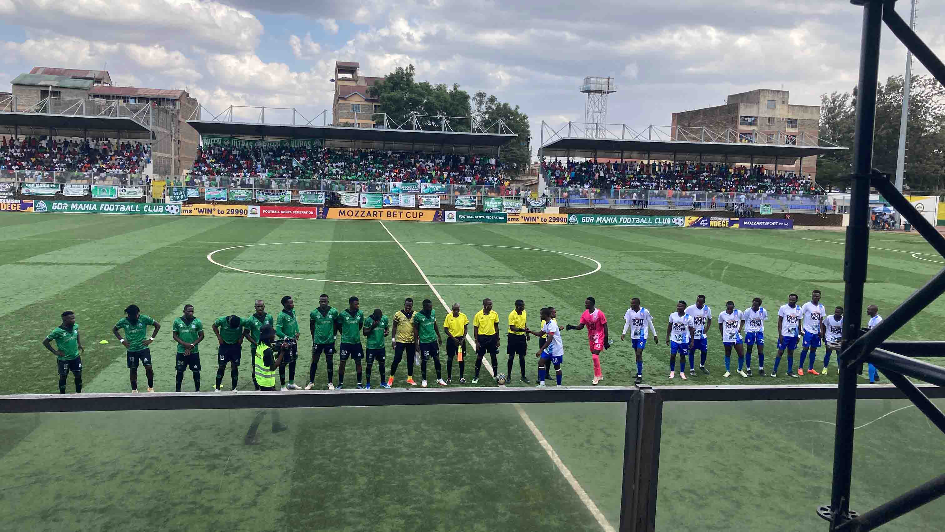 Players line up before kickoff at a Gor Mahia match.
