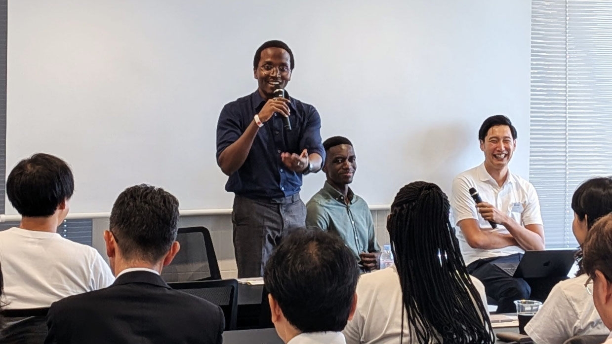 Baraka speaking during the MOL seminar “Kenya × Japan: Connecting the Future Through Human Talent,” with Luwate and the facilitator joining the discussion.