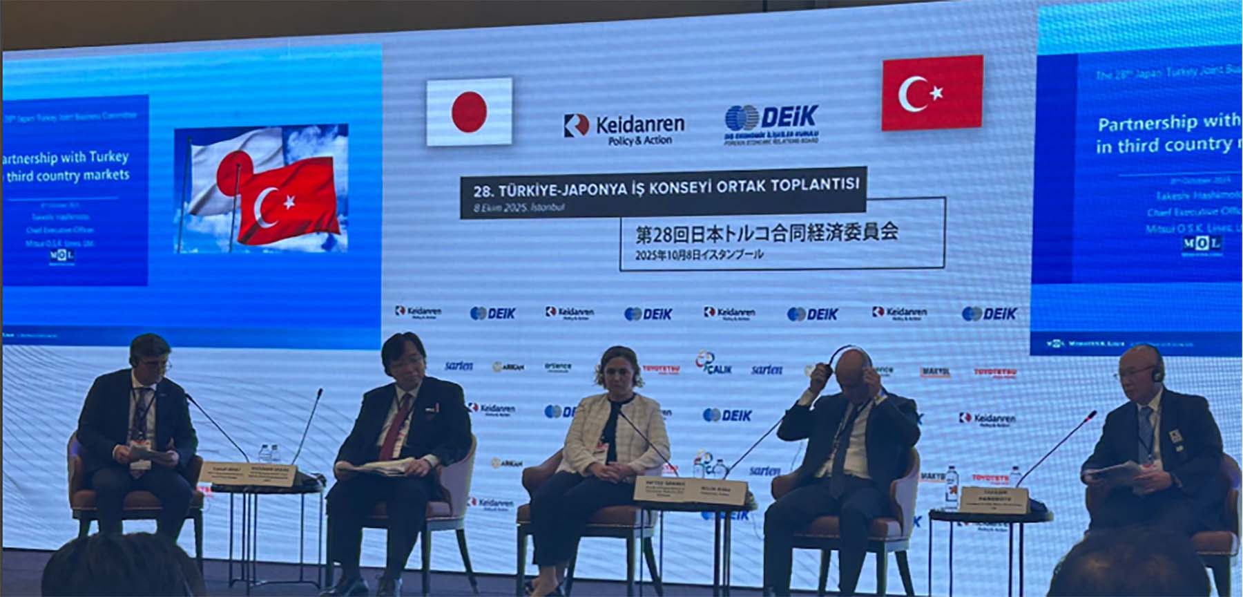 Panel discussion at the 28th Japan-Turkey Joint Economic Committee held in Istanbul, featuring representatives from Japan and Turkey. MOL President Hashimoto is among the speakers presenting on partnerships in third-country markets, with Japan and Turkey flags displayed on the background screen.