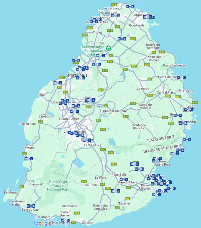 A map of Mauritius displaying locations of NGOs and project sites supported by the MOL Charitable Trust and MMIF, marked with blue MOL flags across the island.