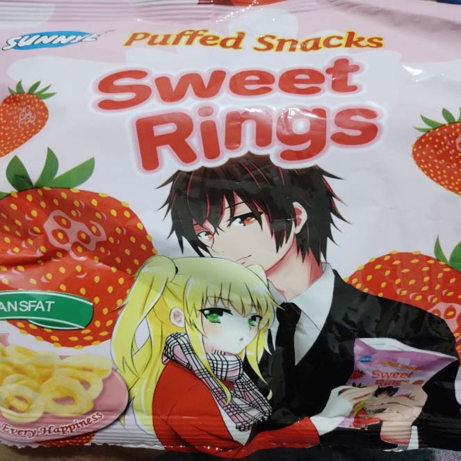Sweet Rings Kenyan snack packaging featuring anime-style characters