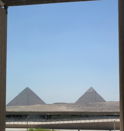 View of the iconic Pyramids of Giza from the Grand Egyptian Museum, highlighting the museum’s unique location near Egypt’s ancient wonders.